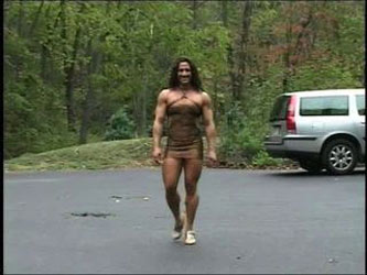Muscle Chick In A Tight Dress